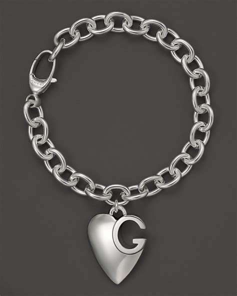 gucci sterling silver heart pendant bracelet|gucci interlocking g silver bracelet.